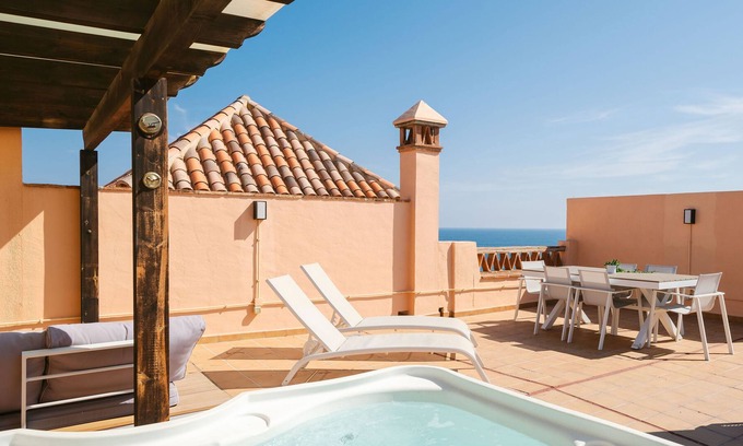 Las Lagunas Apartment | Seafront apartment with spectacular views, massive rooftop terrace, and jacuzzi