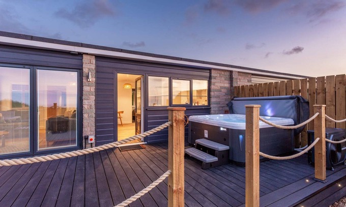 Hele Apartment | Seaview Three Bedroom Residence with Hot Tub