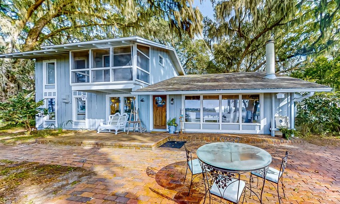 Fernandina Beach House | Secluded riverfront home with dock, firepit, grill, river views, patio, & AC