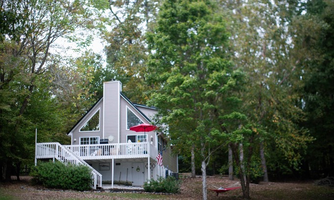 Eatonton House | Serene Lakefront Home with Private Dock, Hot Tub, Fire Pit and Boat!