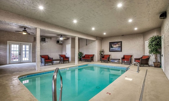 Sevierville Cabin | Serenity Mountain Pool Lodge, Theater Room, Sleeps 42, Indoor Pool!