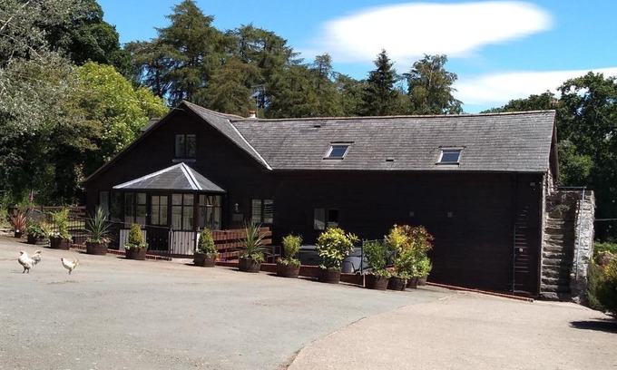 Llanfyllin House | Sheep Dip Cottage - 5* Cyfie Farm, with log burner and private hot tub