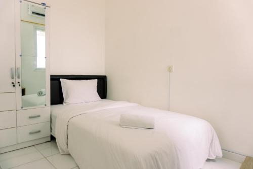 Tangerang Apartment | Simply Studio No Kitchen Apartment at 5th Floor Aeropolis Residence By Travelio