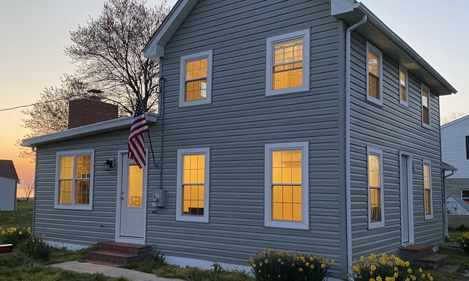 Fishing Creek House | Single family home with screened porch.