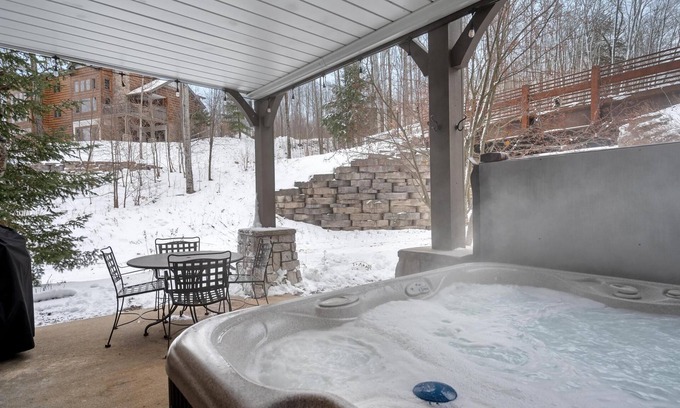 Boyne Falls Condo | Ski-In/Ski-Out Creekside Condo with Private Hot Tub at Boyne Mountain