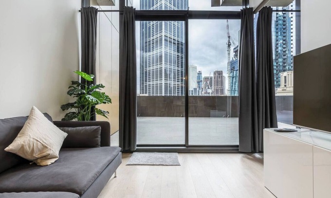 Melbourne Central Business District Apartment | Sky High City Luxury w Huge Deck and Shared Pool