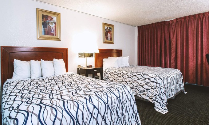 Wichita House | Sky-Palace Inn & Suites Wichita East - Comfort Suite 2 Queen Bed NS Oversized