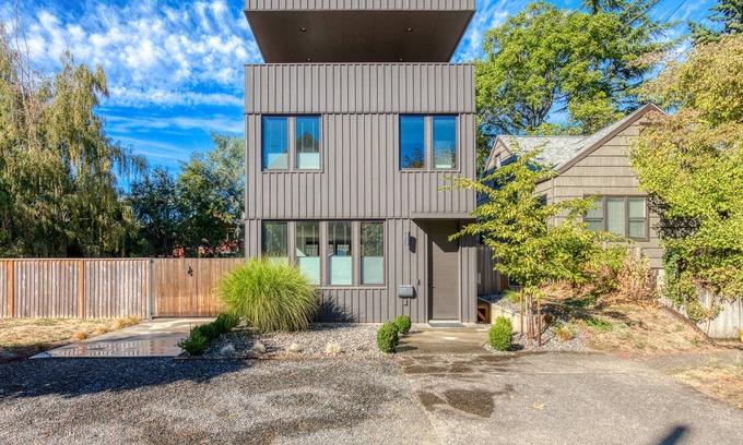 Overlook House | Sleek, modern home with enclosed yard, balcony, patio, WiFi, AC, & W/D