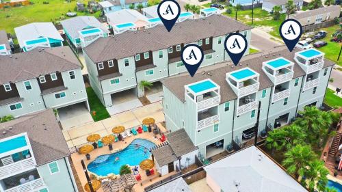 Port Aransas House | Sleeps 33 4 Condos Walk to the Beach Resort-Style Pool Endless Summer Resort