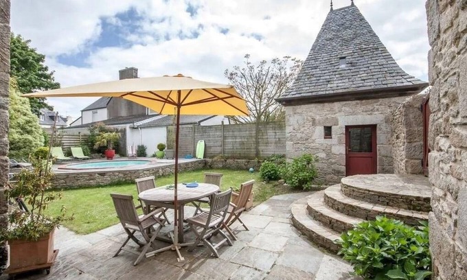 Cleder House | Small manoir fireplace private pool courtyard