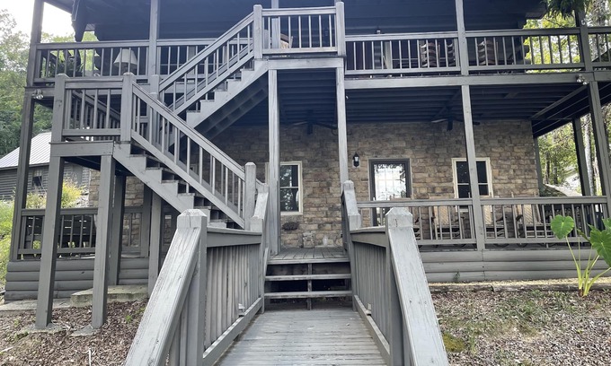 Houston House | Smith Lake Getaway: Lake front, custom log home with private dock and swim deck.
