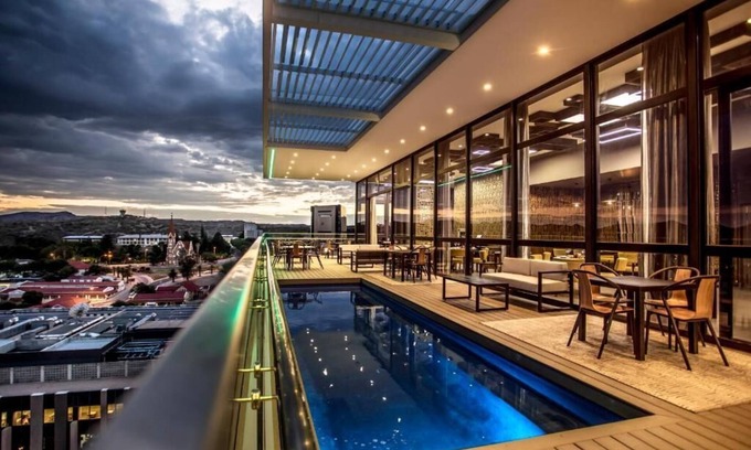 Windhoek Central Apartment | Soak Up the Sun by the Rooftop Pool! Onsite Spa, Parking, Short Walk to Zoo Park