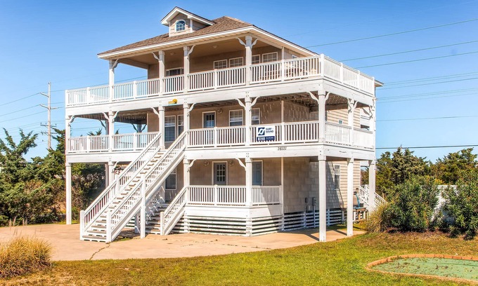 Wind Over Waves House | Soundside Dog Friendly Home w/Pool, Hot Tub, Putting Green, Community Boat Ramp