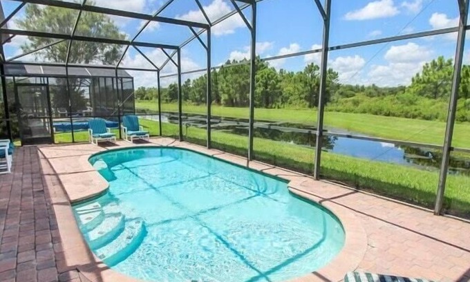 Four Corners House | South-west facing pool - Lake Views - Gated - Game Room