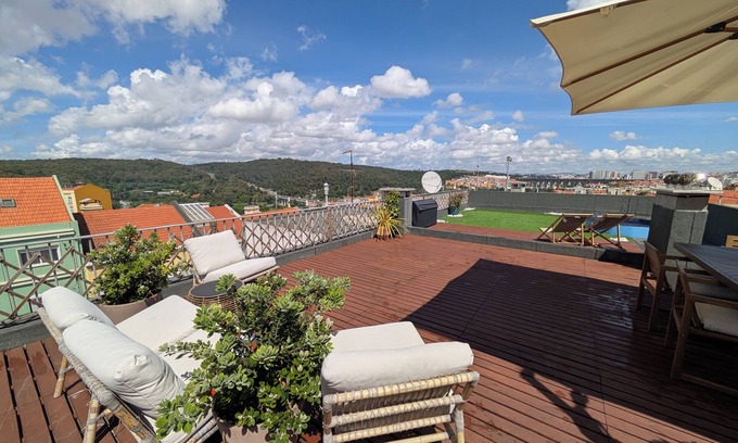 Santo Condestavel Apartment | Spacious 2-Bedroom Duplex with Private Roof Deck and Gym in Campo de Ourique