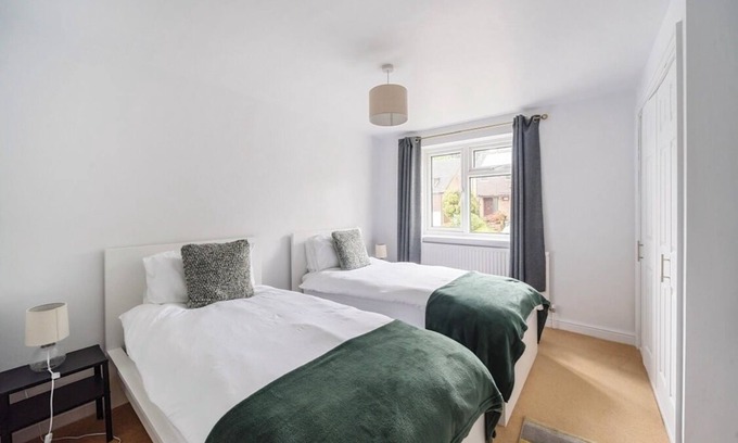 Charlton Kings House | Spacious 4-bedroom townhome in charming Charlton Kings with driveway parking