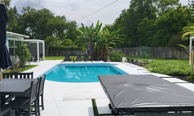 City Center House | Spacious 4-bedroom house in family friendly Coral Springs with all amenities.