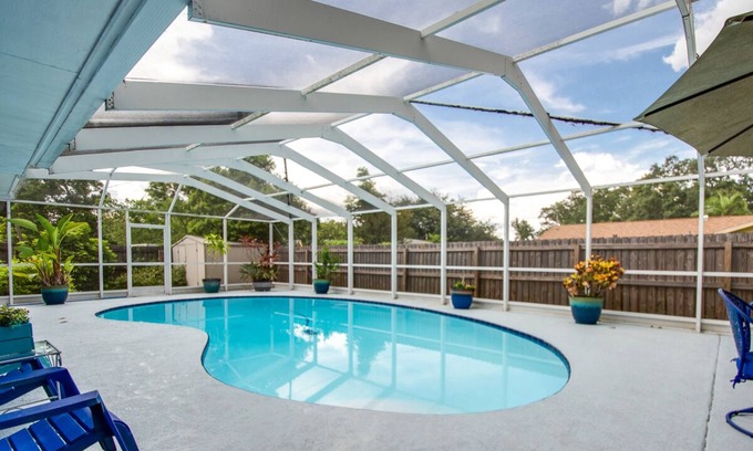 Clearwater House | Spacious 4 bedroom home ~ 2 King beds, heated pool, 15 mins to Clearwater Beach