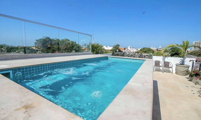 Cartagena District House | Spacious 9-bedroom house with WiFi, AC in vibrant Cartagena Bolivar +Bonus