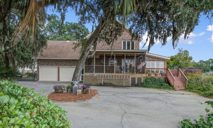 North Charleston House | Spacious and inviting riverview home with a private pool, screened porch