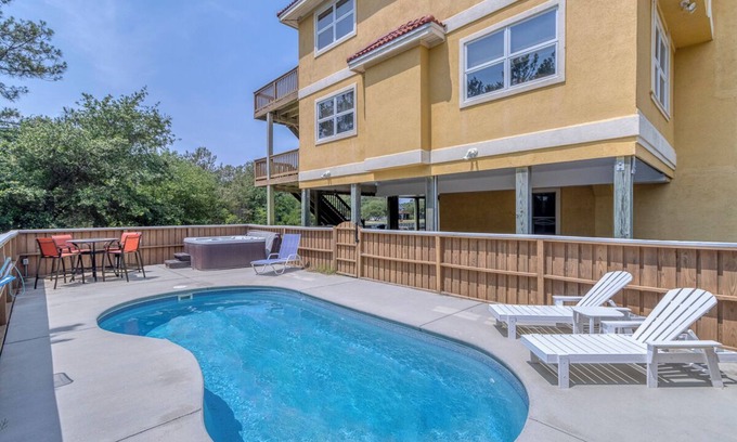 Carova Beach House | Spacious canalfront home w/pool & hot tub on the 4x4 beaches of Carova!