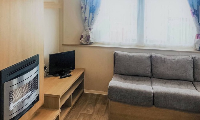 Skegness House | Spacious caravan with one double and two twin.