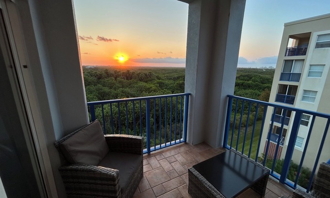 New Smyrna Beach Condo | Spacious Corner Unit Beach Condo with Nightly Sunsets Over the Nature Preserve