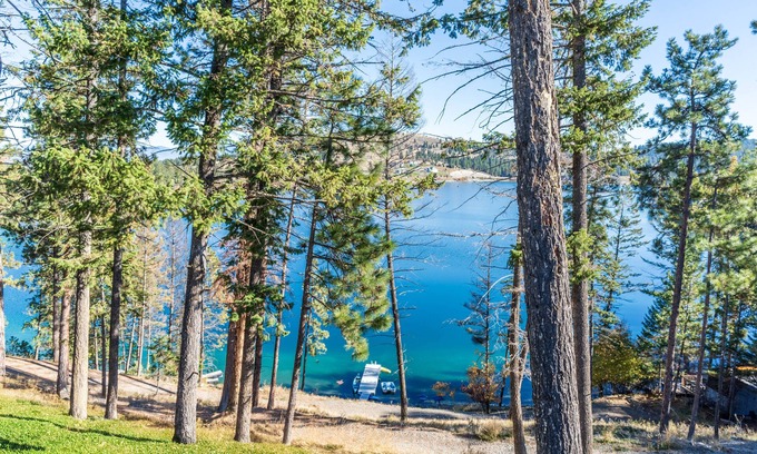 Kalispell House | Spacious Lakefront Home with Private Hot Tub, Kayaks, Canoes & Dock