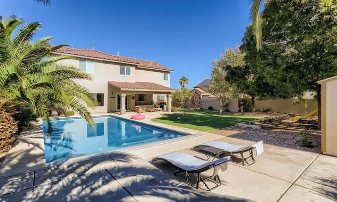 Rhodes Ranch House | Spacious Luxury Desert Retreat with Heated Pool, Putt putt and a playground for