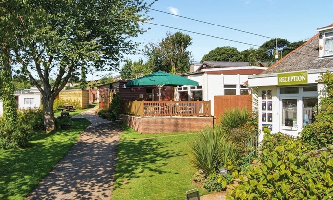 Sandown House | Spacious modern caravan with one double and two twin.