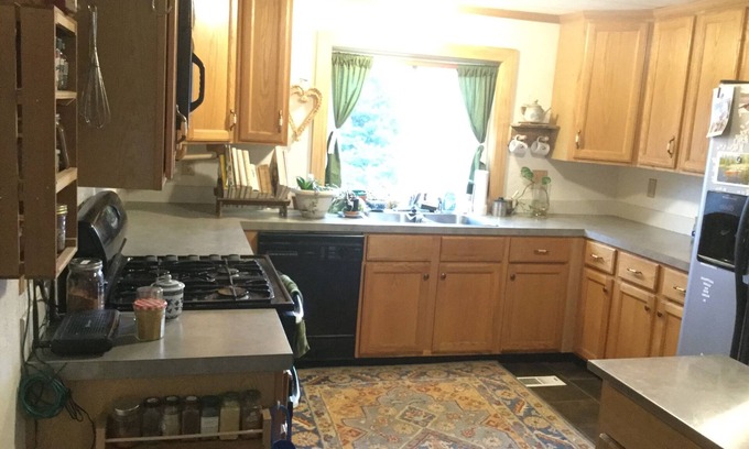 Fort Collins House | Spacious yard, cozy living space, pet friendly, great location