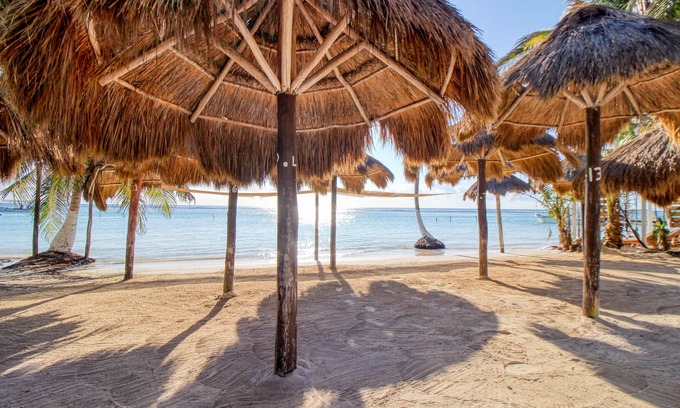 Majahual House | Spanish-style home with pool, W/D, 2 living areas & 2 kitchenettes - near beach