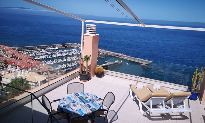 Los Gigantes Apartment | SPECTACULAR SUNNY APARTMENT WITH WIFI, POOL, PANORAMIC CLIFF & SEA VIEWS.