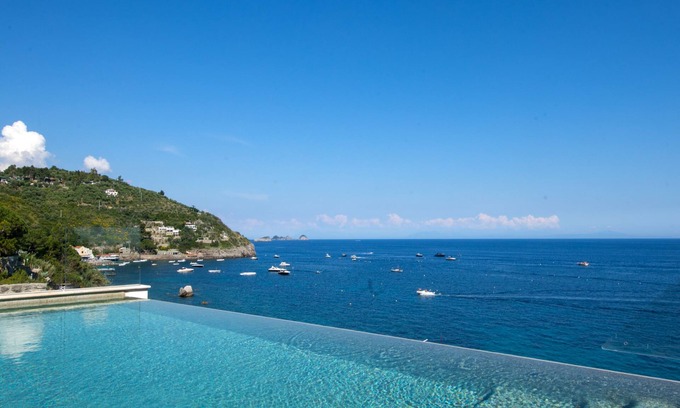 Marina del Cantone Villa | Splendid luxury VILLA IBISCUS overlooking the sea with infinity pool