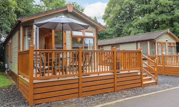Troutbeck Bridge Cabin | SQUIRRELS LEAP LODGE, pet friendly, with a garden in Windermere