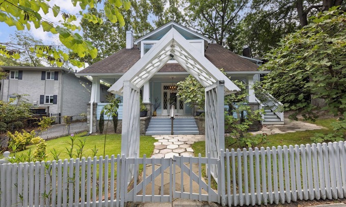 Midtown Apartment | Stay in the heart of Midtown at this charming 3BR/2BA triplex unit—just a half-mile to Piedmont Park, Park Tavern, and Trader Joe’s. Enjoy a cozy fireplace, front patio, and private upstairs terrace. Digital check-in, street parking, and smart TVs.