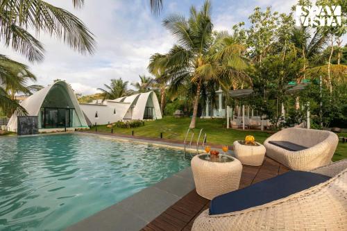 Shrirangapattana Villa | StayVista at Shwaas 4BR Mysore with Private pool and landscape
