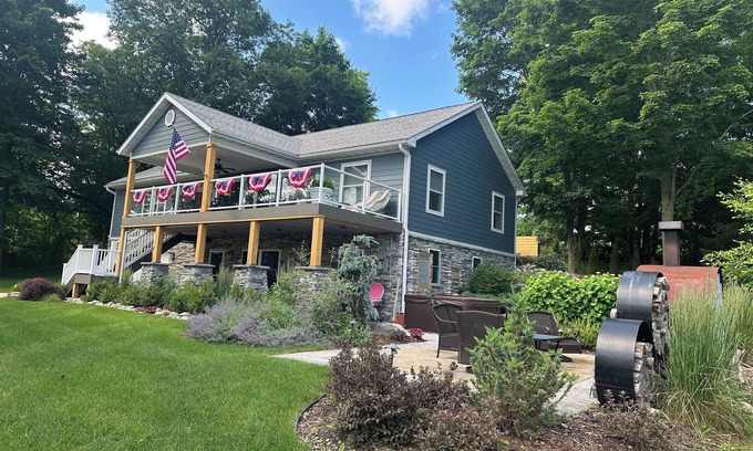 Boyne City House | Steps from Lake Charlevoix with great views. Pool & beach access for a fee.
