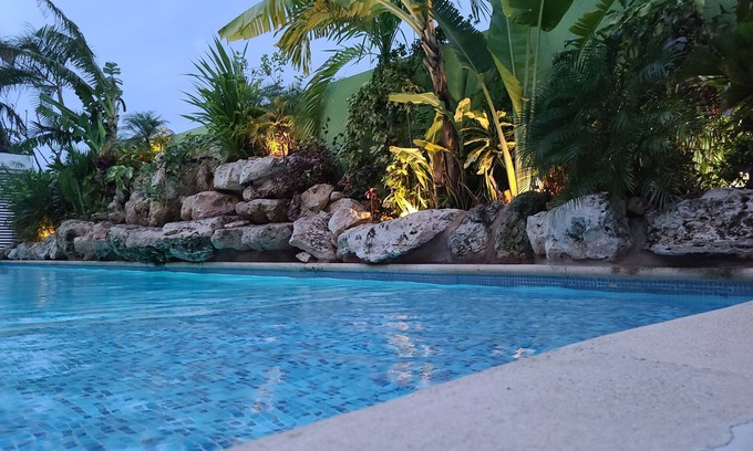Luis Donaldo Colosio House | Steps from the beach 3-bedroom plus loft bedroom townhome, WiFi, AC & roof top.