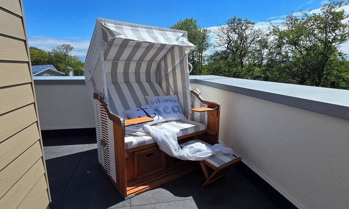 Tossens Apartment | StrandGut 49 - Penthouse with a view. Sauna. Roof terrace. Exclusive.
