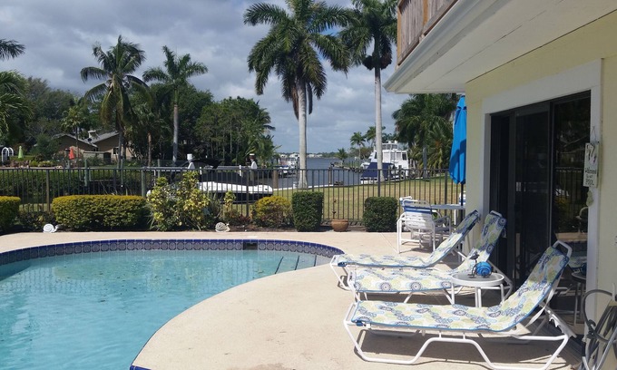 North River Shores House | Stuart Waterfront Tropical Paradise heated pool. Close to beaches and downtown.