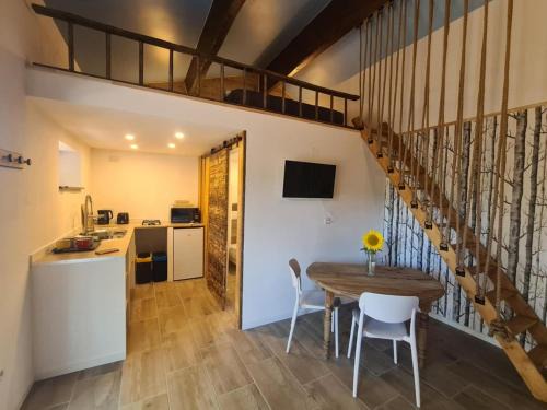 Chassiecq House | Studio mezzanine chez des mushers