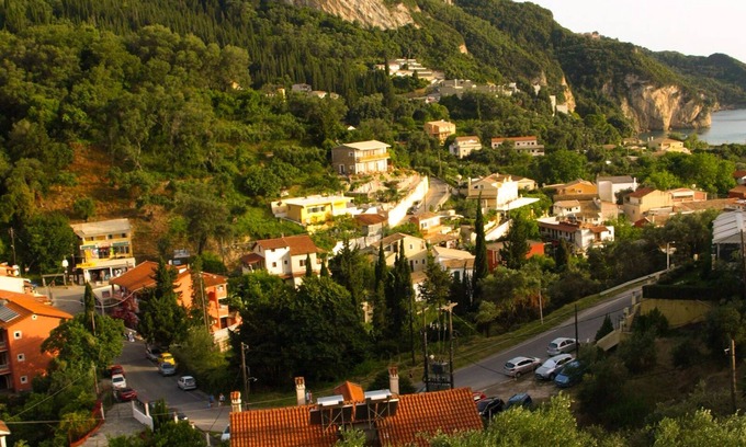 Agios Gordios Apartment | Studio with sea view, balcony, kitchenette, a/c, safe box