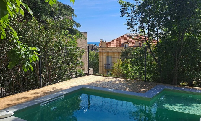 Bastia House | Stunning 19th century Maison de Maître with sea view swimming pool in garden centre ville
