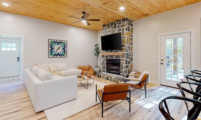 Foscoe Cottage | Stunning dog-friendly cottage with riverfront patio, hot tub, fire pit, & views