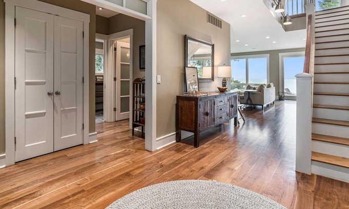 Michiana House | Stunning lakefront home & guest house with pool, beach, terraces, & views