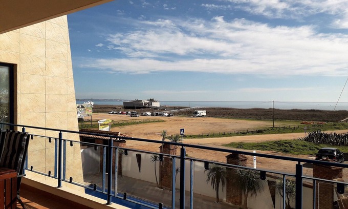 Meia Praia Apartment | Stunning Modern 2 Bedroom Apartment with Seaviews and Communal Roof Terrace Pool