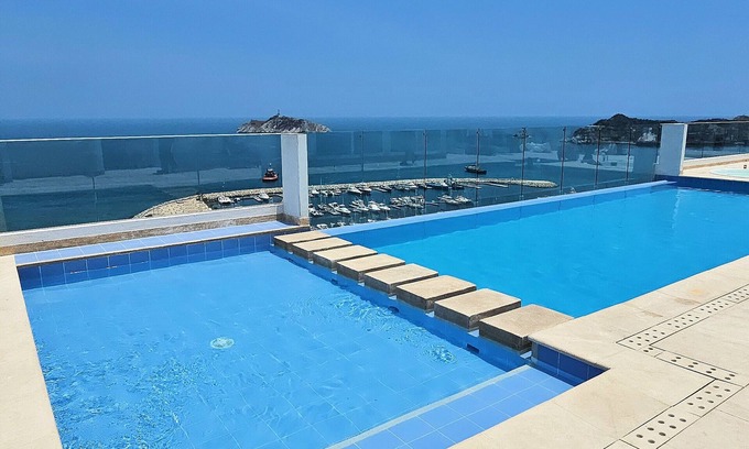 Historic Center Apartment | STUNNING NEW APARTMENT, 2 BALCONIES OCEAN VIEW ROOFTOP POOL DOWNTOWN SANTA MARTA