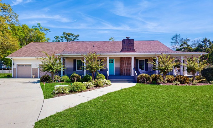 Sea Trail House | Stunning waterfront coastal home close to the beach and local attractions