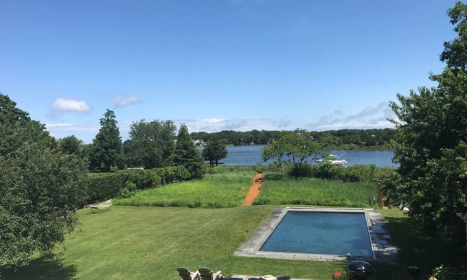 Sag Harbor House | Stunning Waterfront Home with Pool, Boat Dock, and Acre of Land